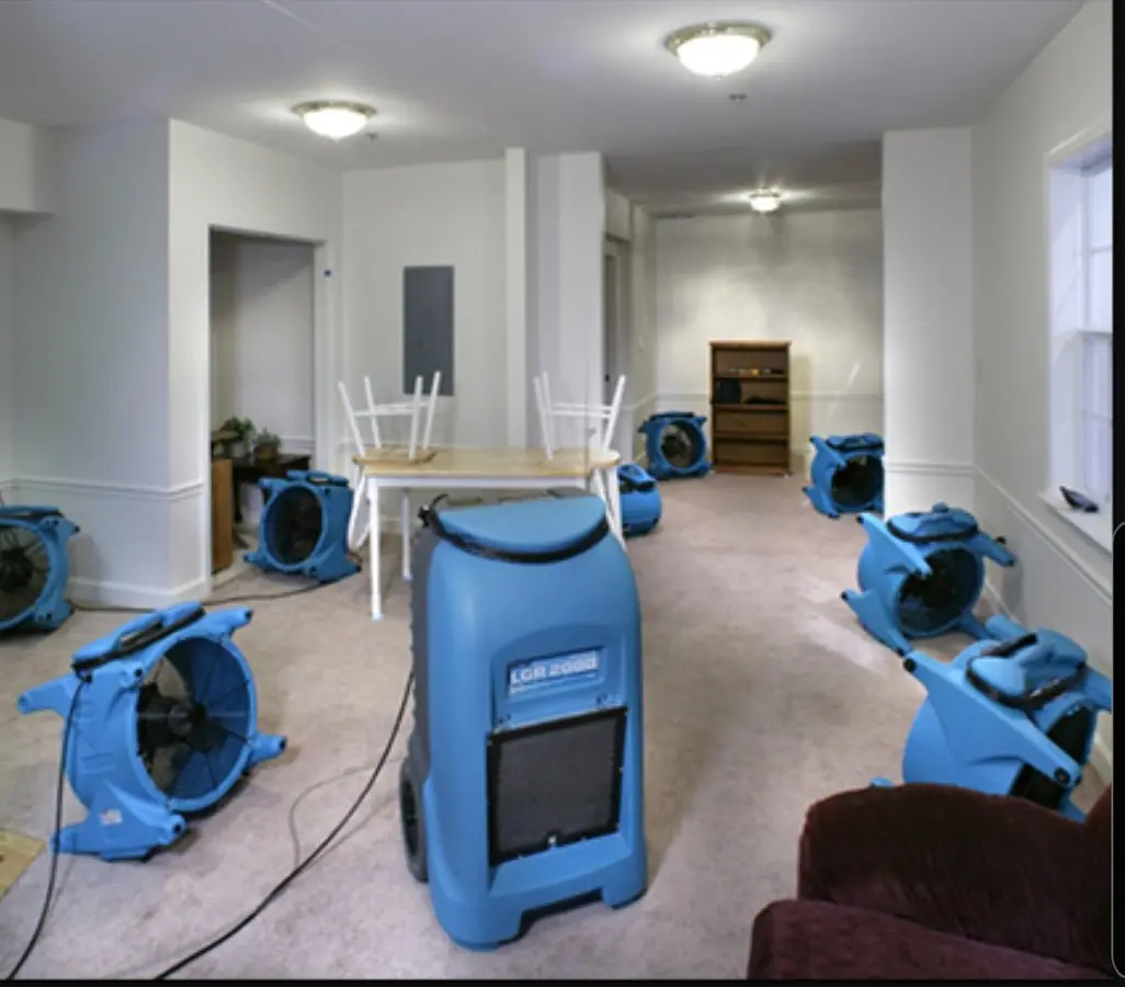 Air movers and dehumidifier setup for Water Extraction & Removal in St. James